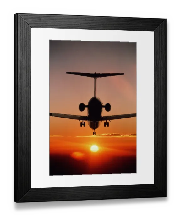 Framed Print : Boeing MD-80 airliner landing at sunset Framed Print : Boeing MD-80 airliner landing at sunset