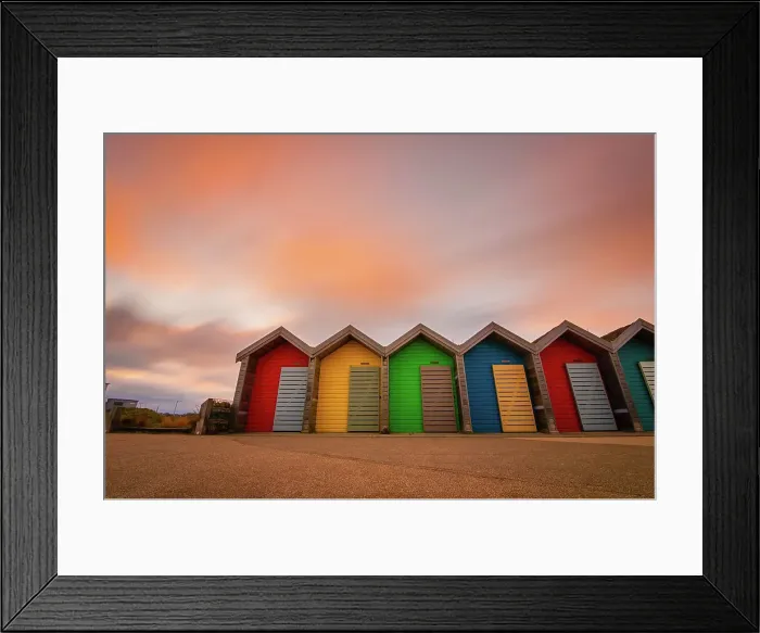 Framed Print : Vivid coloured beach huts at sunset Framed Print : Vivid coloured beach huts at sunset