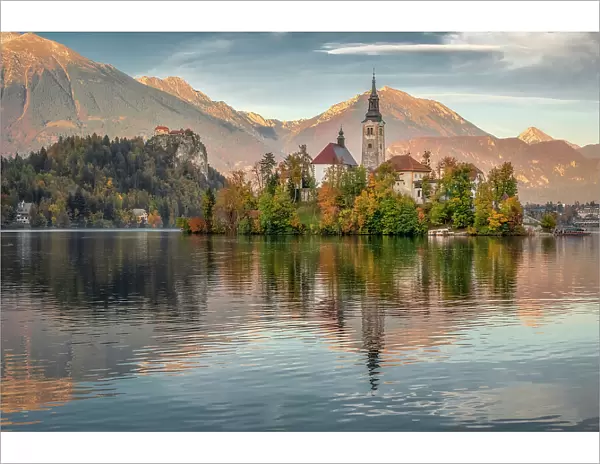 Bled Island and Bled Castle surrounded with Julian Alps Reflection on Lake Bled