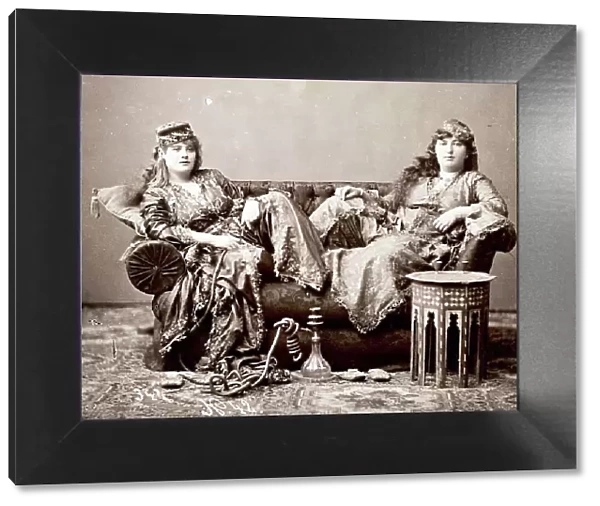 Two Women in Turkish Costume Sitting on a Sofa, 1870, Turkey, Historic, digitally restored reproduction from a 19th century original