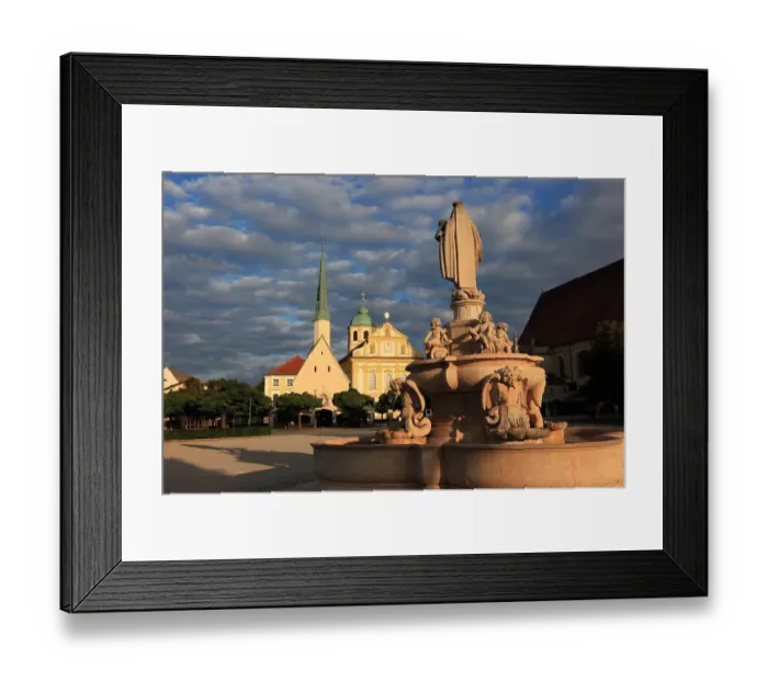 Framed Print : Marienbrunnen, Capuchin Church of Saint Magdalena, Kapellplatz with the Chapel of Grace, Altoetting, Upper Bavaria, Germany