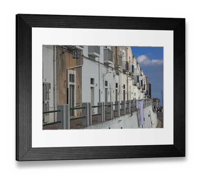 Framed Print : Monte Sant Angelo, white houses along the road, Gargano, Apulia, Italy Framed Print : Monte Sant Angelo, white houses along the road, Gargano, Apulia, Italy