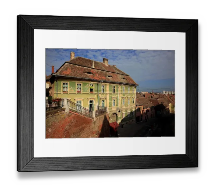 Framed Print : Old Saxon house in need of renovation in the old town of Sibiu, Romania Framed Print : Old Saxon house in need of renovation in the old town of Sibiu, Romania