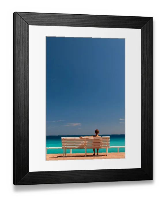 Framed Print : Contemplation on a bench facing the sea Framed Print : Contemplation on a bench facing the sea