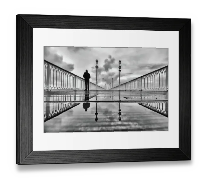 Framed Print : Silhouette on a pier on a rainy winter morning Framed Print : Silhouette on a pier on a rainy winter morning