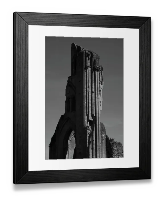 Framed Print : Low angle view of Glastonbury Abbey ruins against clear sky, Somerset, UK Framed Print : Low angle view of Glastonbury Abbey ruins against clear sky, Somerset, UK
