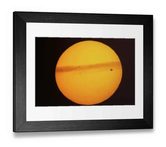 Framed Print : Rare transit of the planet Venus across the face of the sun that took place on June 5, 2012. The sun was close to the horizon and in addition to the silhouette of Venus Framed Print : Rare transit of the planet Venus across the face of the sun that took place on June 5, 2012. The sun was close to the horizon and in addition to the silhouette of Venus