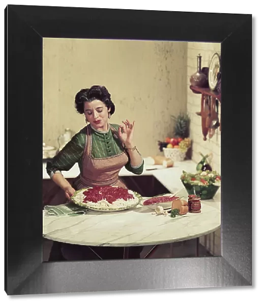 Woman holding tray of noodles and gesturing