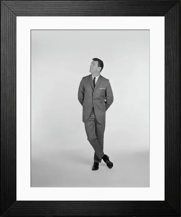 Framed Print : Businessman standing on white background, smiling Framed Print : Businessman standing on white background, smiling