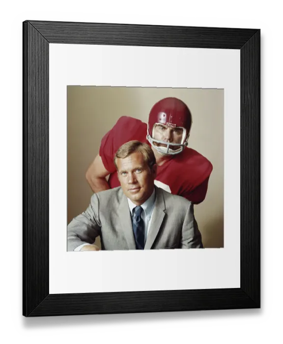Framed Print : Coach with American football player, portrait Framed Print : Coach with American football player, portrait