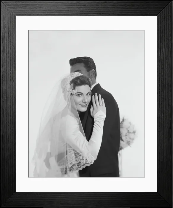 Framed Print : Bride and groom hugging, smiling Framed Print : Bride and groom hugging, smiling