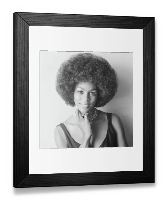 Framed Print : Young woman against white background, smiling, portrait Framed Print : Young woman against white background, smiling, portrait