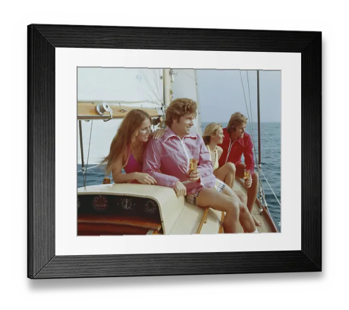 Framed Print : Couples sitting on sailing boat, smiling Framed Print : Couples sitting on sailing boat, smiling