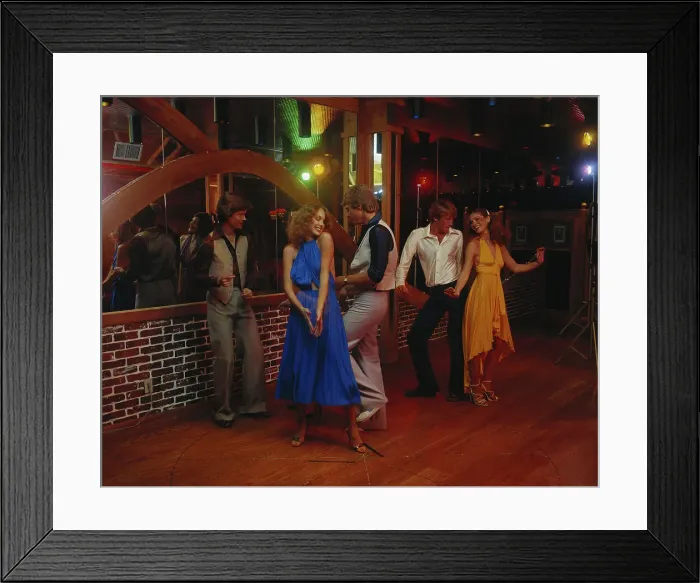 Framed Print : Couples dancing together at nightclub, smiling Framed Print : Couples dancing together at nightclub, smiling