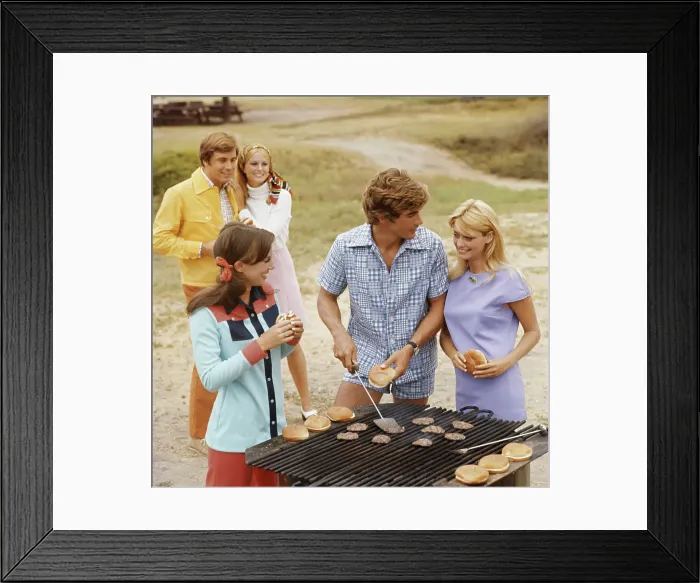 Framed Print : Friends having barbecue, smiling Framed Print : Friends having barbecue, smiling