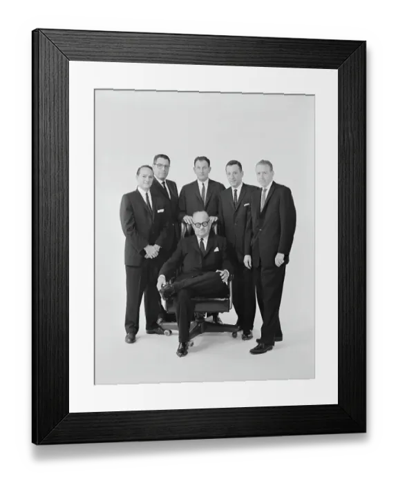 Framed Print : Businessmen against white background, portrait