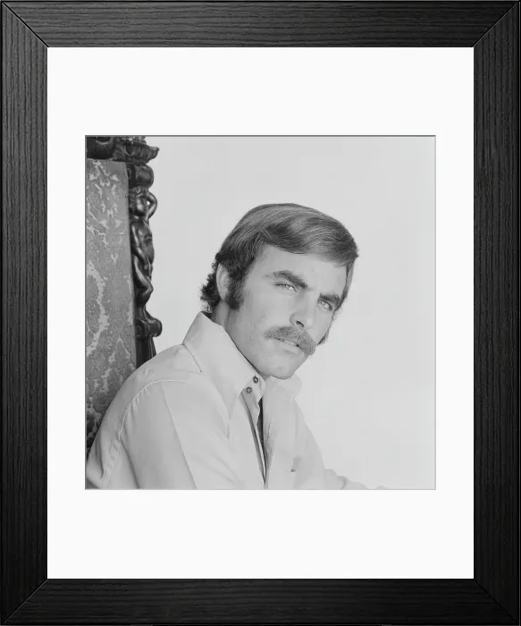 Framed Print : Man sitting on chair, portrait