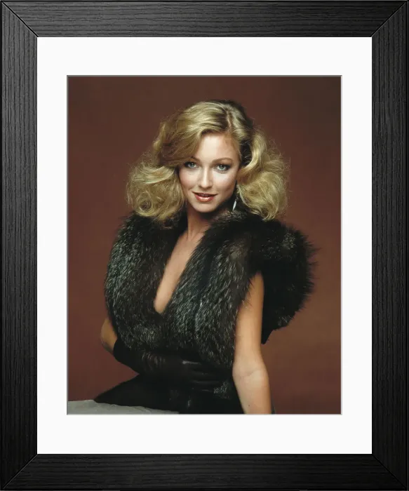 Framed Print : Young woman wearing fur clothes, smiling, portrait Framed Print : Young woman wearing fur clothes, smiling, portrait