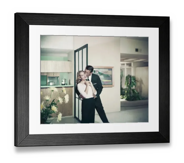 Framed Print : Man kissing woman, smiling Framed Print : Man kissing woman, smiling