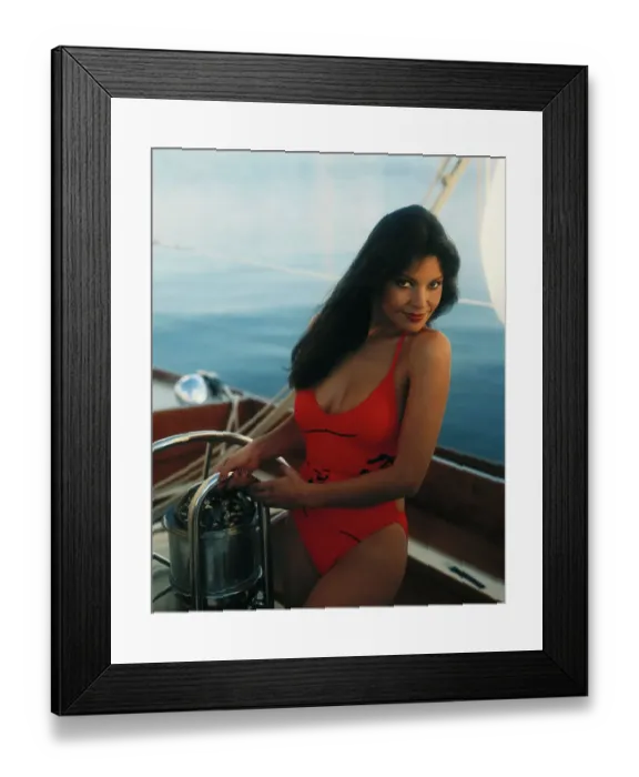 Framed Print : Woman standing in sailboat, smiling, portrait Framed Print : Woman standing in sailboat, smiling, portrait
