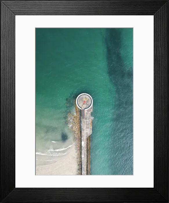 Framed Print : Drone shot above a small lighthouse on a pier, Looe, Cornwall, United Kingdom Framed Print : Drone shot above a small lighthouse on a pier, Looe, Cornwall, United Kingdom