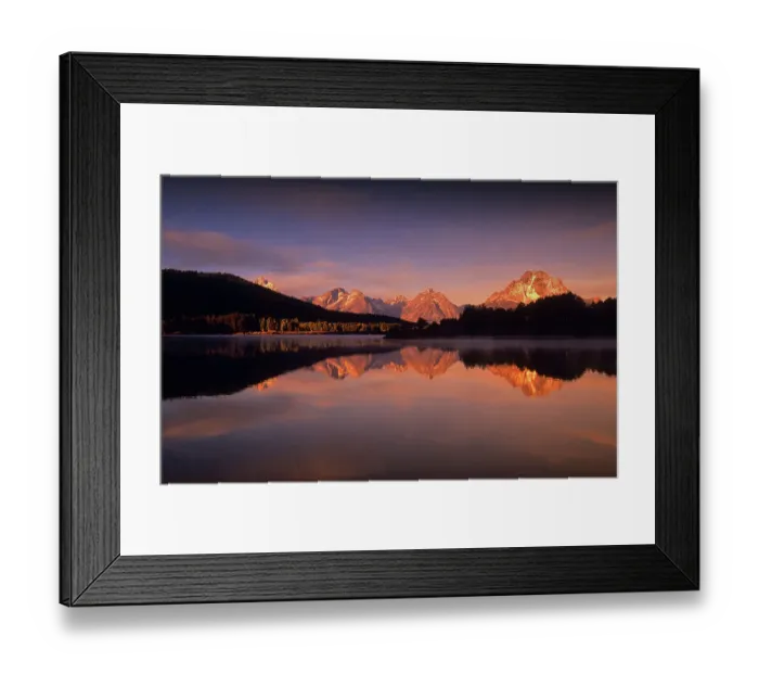 Framed Print : A beautiful coloured dawn casts its glow over Jackson lake in the Grand Tetons, Wyoming Framed Print : A beautiful coloured dawn casts its glow over Jackson lake in the Grand Tetons, Wyoming