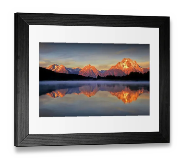 Framed Print : A beautiful coloured dawn casts its glow over Jackson lake in the Grand Tetons, Wyoming Framed Print : A beautiful coloured dawn casts its glow over Jackson lake in the Grand Tetons, Wyoming