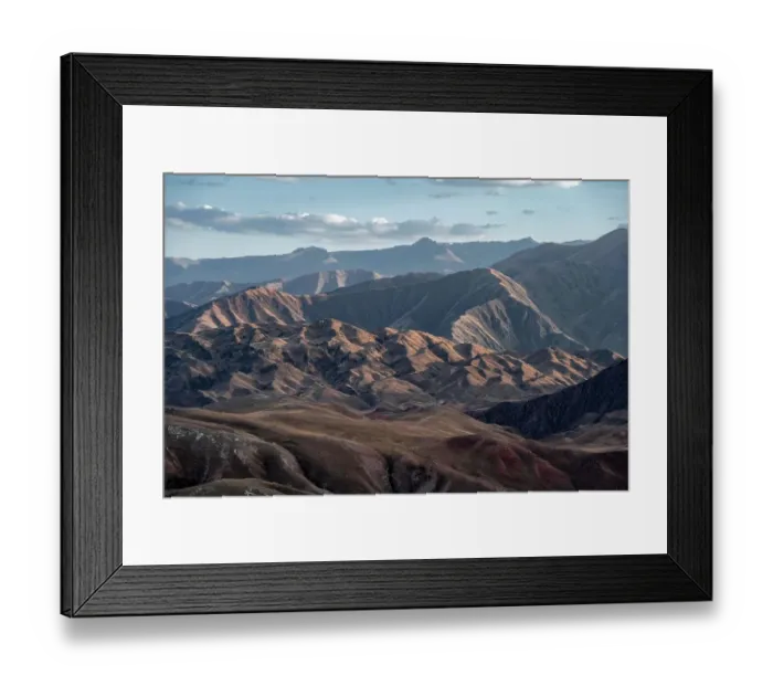 Framed Print : View over eroded mountainous landscape with brown hills, Konorchek Canyon, Chuy, Kyrgyzstan Framed Print : View over eroded mountainous landscape with brown hills, Konorchek Canyon, Chuy, Kyrgyzstan