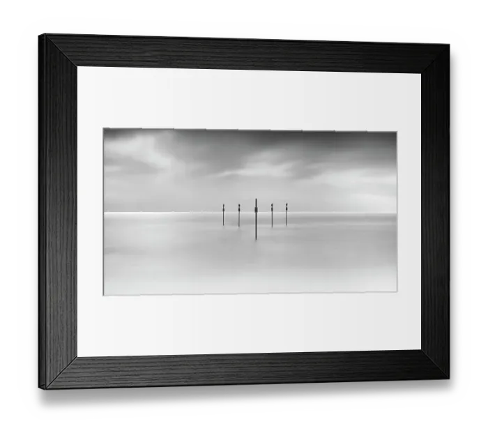 Framed Print : Minimal posts are arranged symmetrically in sea Framed Print : Minimal posts are arranged symmetrically in sea