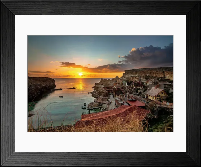 Framed Print : Sunset over Popeye Village, limits of Mellieha, Malta Framed Print : Sunset over Popeye Village, limits of Mellieha, Malta