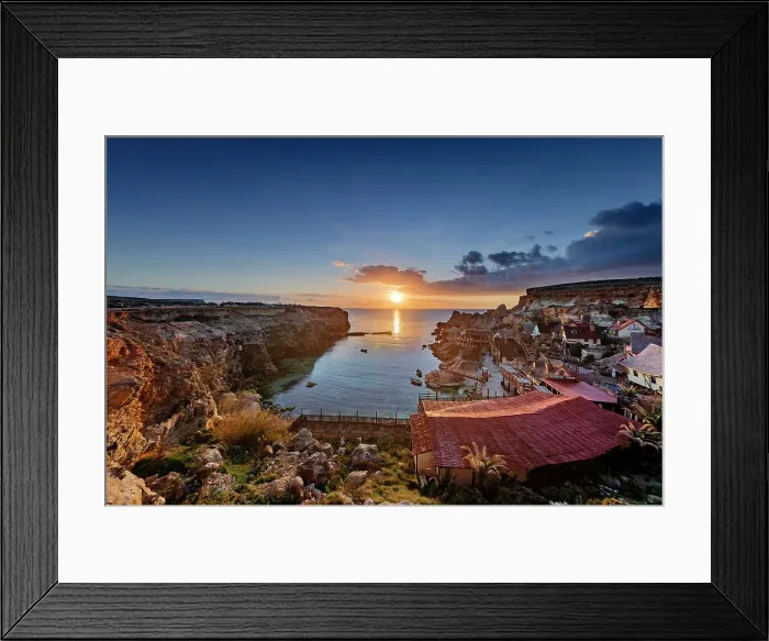 Framed Print : Sunset over Popeye Village, limits of Mellieha, Malta Framed Print : Sunset over Popeye Village, limits of Mellieha, Malta