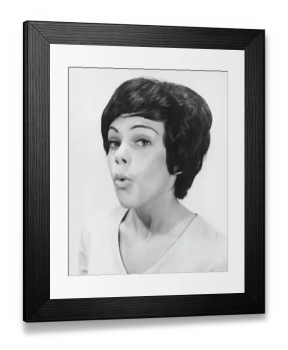 Framed Print : Woman whistling, posing in studio, (B&W), portrait Framed Print : Woman whistling, posing in studio, (B&W), portrait