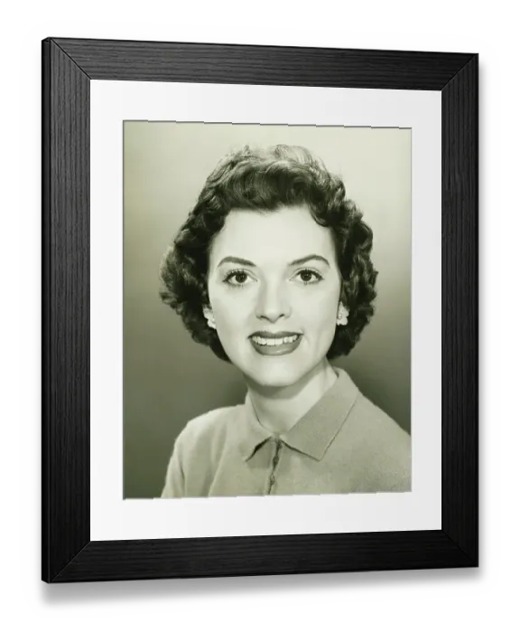 Framed Print : Smiling woman in studio, (B&W), close-up, portrait Framed Print : Smiling woman in studio, (B&W), close-up, portrait