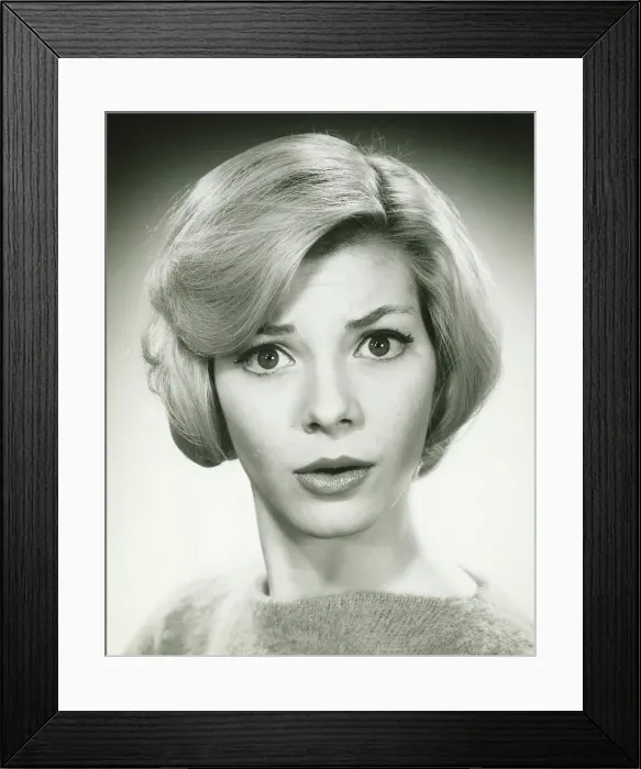 Framed Print : Young woman with incredulously expression in studio, (B&W), (Portrait) Framed Print : Young woman with incredulously expression in studio, (B&W), (Portrait)