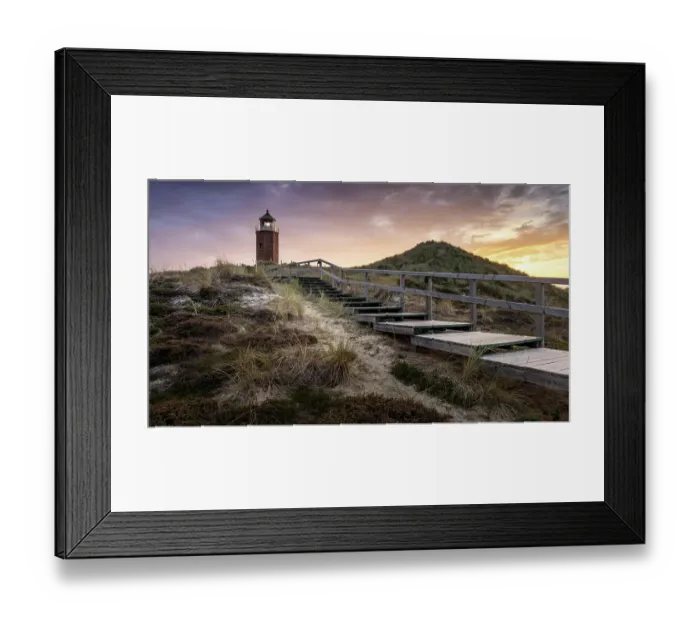 Framed Print : Colourful sunset behind the smallest lighthouse, the Quermarkenfeuer, on the North Frisian island of Sylt, Germany Framed Print : Colourful sunset behind the smallest lighthouse, the Quermarkenfeuer, on the North Frisian island of Sylt, Germany