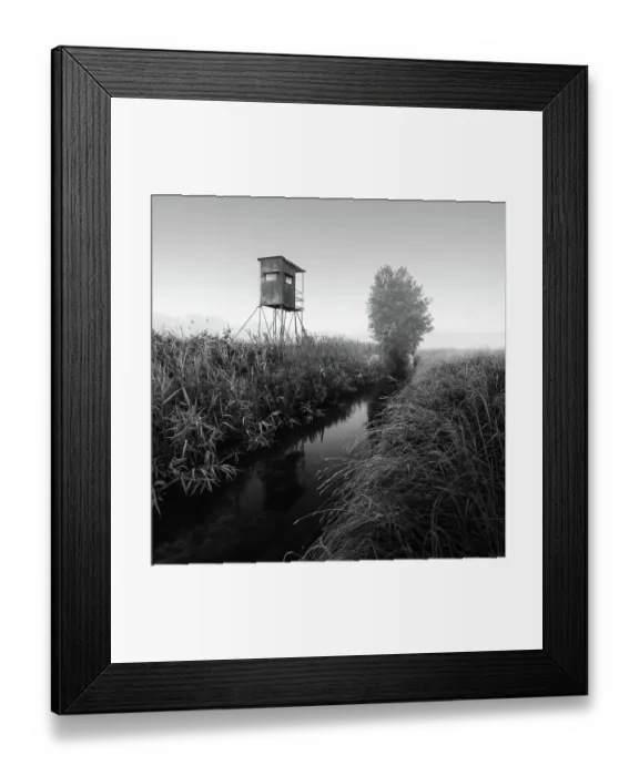 Framed Print : German floodplain landscape in Brandenburg with high seat on the Nuthe in black and white, Luckenwalde, Germany