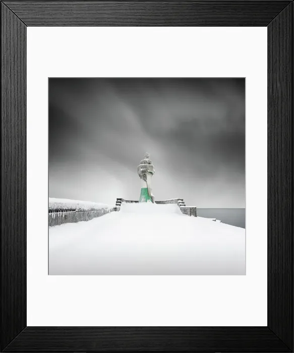 Framed Print : Iced lighthouse in the harbour of Sassnitz, Ruegen, Germany Framed Print : Iced lighthouse in the harbour of Sassnitz, Ruegen, Germany