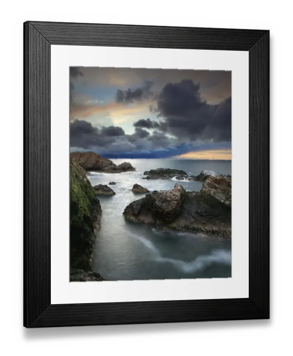 Framed Print : Sunset light rocky coast storm clouds sea Framed Print : Sunset light rocky coast storm clouds sea