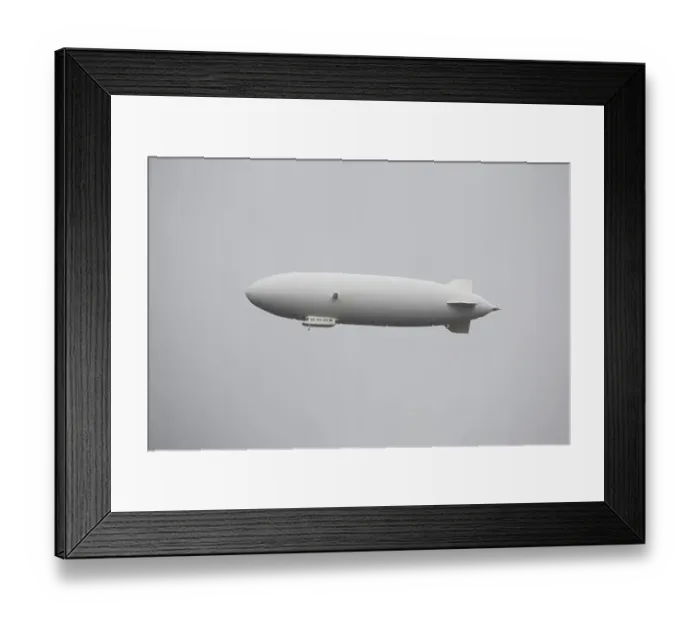 Framed Print : White zeppelin in the sky, lindau, germany Framed Print : White zeppelin in the sky, lindau, germany