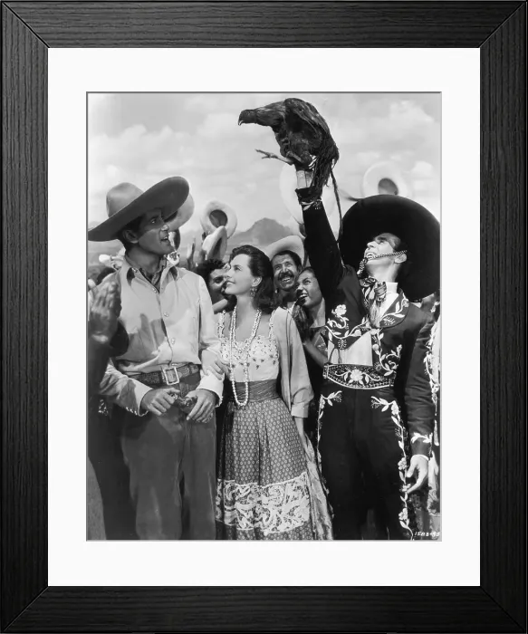 Framed Print : Sombrero. 1953: Mexican-born actor Ricardo Montalban holds a rooster in Framed Print : Sombrero. 1953: Mexican-born actor Ricardo Montalban holds a rooster in