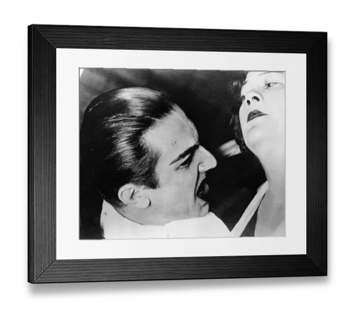 Framed Print : Dracula. circa 1931: Bela Lugosi (1882 - 1956) about to drink a maiden's blood in a scene Framed Print : Dracula. circa 1931: Bela Lugosi (1882 - 1956) about to drink a maiden's blood in a scene