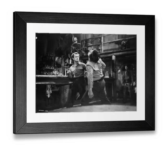 Framed Print : Shane. American tough guy actor Alan Ladd (1913 - 1964) lays his opponent Framed Print : Shane. American tough guy actor Alan Ladd (1913 - 1964) lays his opponent