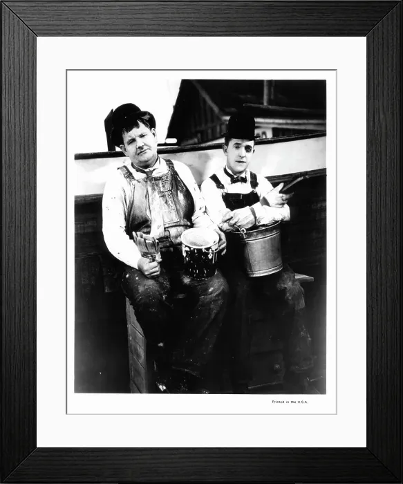 Framed Print : Oliver Hardy And Stan Laurel In Towed In A Hole