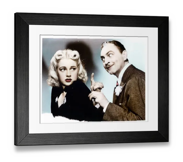 Framed Print : Virginia Bruce And John Barrymore In The Invisible Woman
