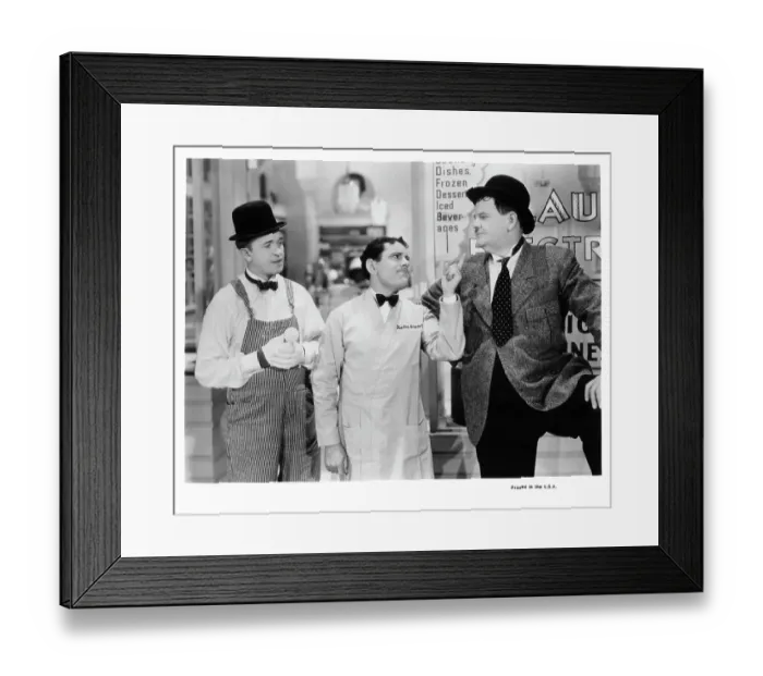 Framed Print : Stan Laurel And Oliver Hardy In Tit For Tat Framed Print : Stan Laurel And Oliver Hardy In Tit For Tat