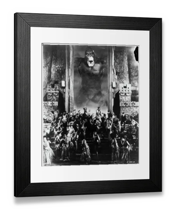 Framed Print : King Kong. Kong the immense prehistoric ape attacks group of men who are Framed Print : King Kong. Kong the immense prehistoric ape attacks group of men who are