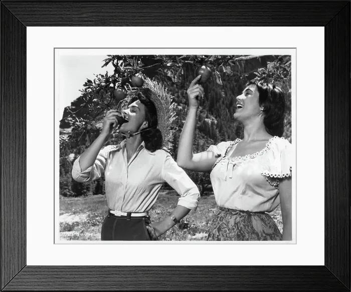 Framed Print : Donna Reed bites And Roberta Haynes In Gun Fury Framed Print : Donna Reed bites And Roberta Haynes In Gun Fury