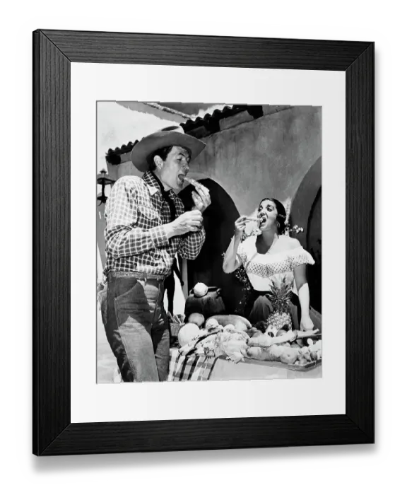 Framed Print : Smoky. Co-stars Fess Parker and Katy Jurado eating on the set of the western film Smoky Framed Print : Smoky. Co-stars Fess Parker and Katy Jurado eating on the set of the western film Smoky