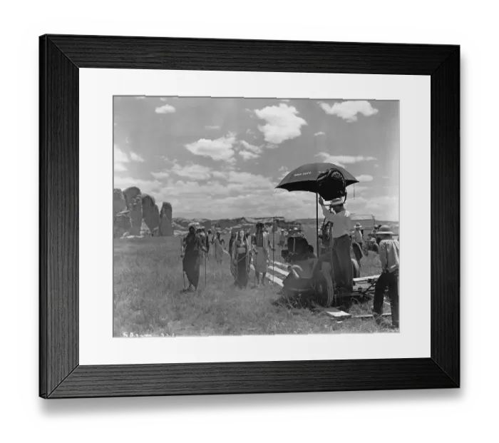 Framed Print : Sundown. Actress Gene Tierney films a scene on location, for the movie Sundown, 1941 Framed Print : Sundown. Actress Gene Tierney films a scene on location, for the movie Sundown, 1941