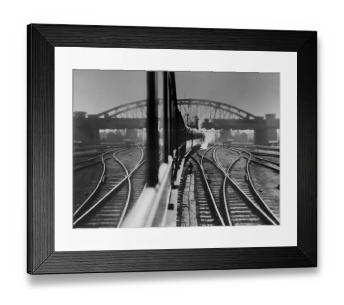 Framed Print : Railroad. 16th March 1931: A train pulls out of Peterborough Station in Cambridgeshire Framed Print : Railroad. 16th March 1931: A train pulls out of Peterborough Station in Cambridgeshire